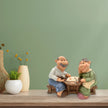 Pareja de Ancianos Jugando Damas