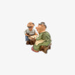 Pareja de Ancianos Jugando Damas