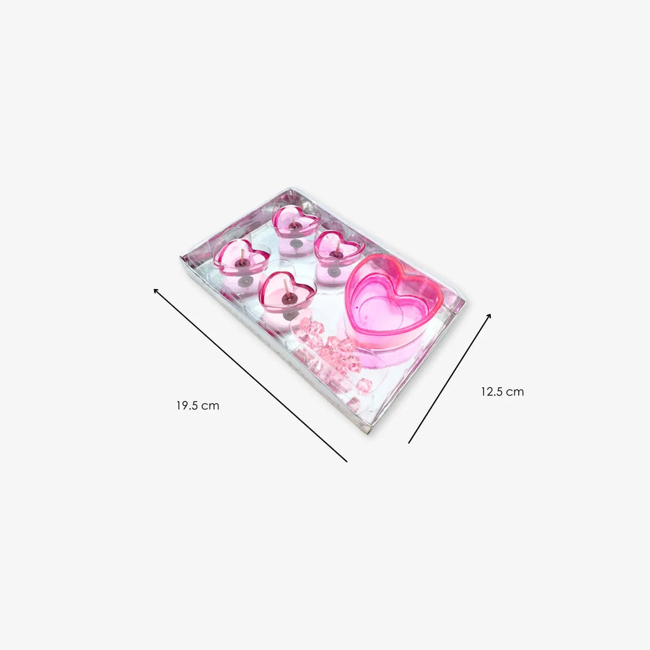Paquete de 4 velas en forma de corazón con piedritas