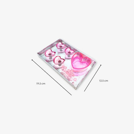 Paquete de 4 velas en forma de corazón con piedritas