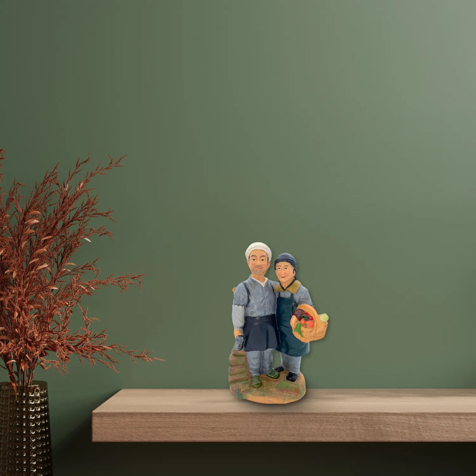 Adorno pareja de ancianos de ceramica